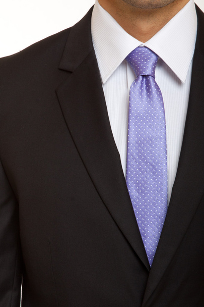 Traje gris con corbata azul
 - Foto, imagen