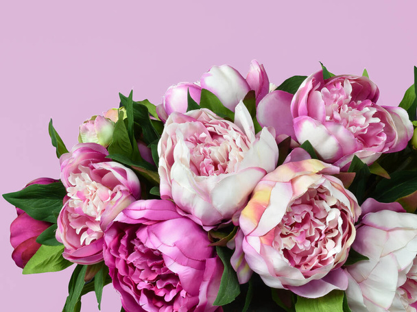 Peony bouquet with pink colored background. - Zdjęcie, obraz