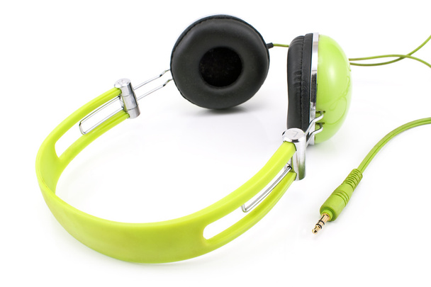 zelená sluchátka izolované na bílém pozadí - Fotografie, Obrázek