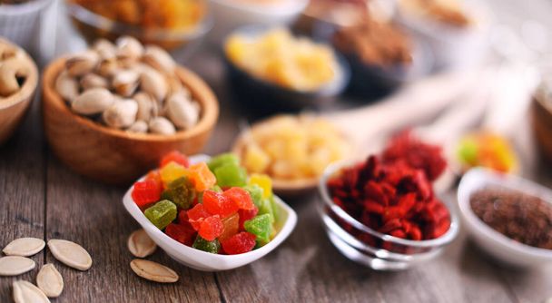 Composition with dried fruits and assorted nuts. Delicacies. - Photo, image