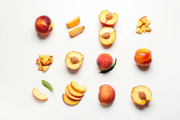 Sweet ripe peaches on white background - Φωτογραφία, εικόνα