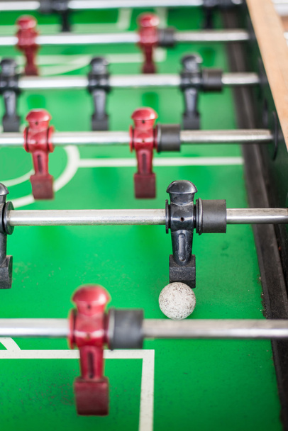 Close up of a foosball game with soccer ball - Photo, image