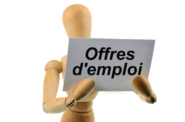 Manichino articolato in legno lettura posti di lavoro vacanti in francese su sfondo bianco - Foto, immagini