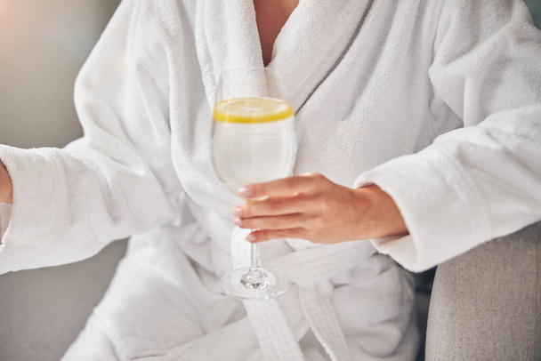 Spa client dressed in a terry bathrobe - Photo, Image