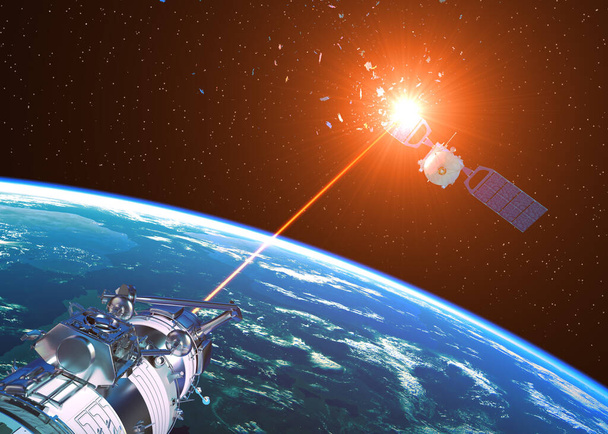 Działo laserowe obezwładnia satelitę wroga w kosmosie. - Zdjęcie, obraz