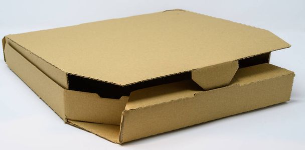 Una scatola per la consegna della pizza da asporto non stampata - Foto, immagini