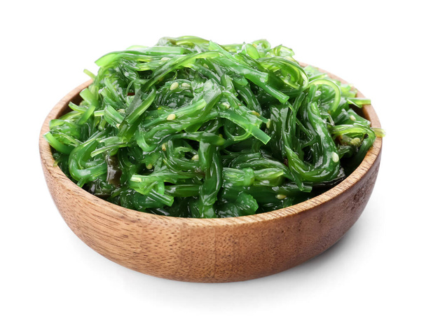 Bowl with tasty seaweed salad on white background - Photo, Image