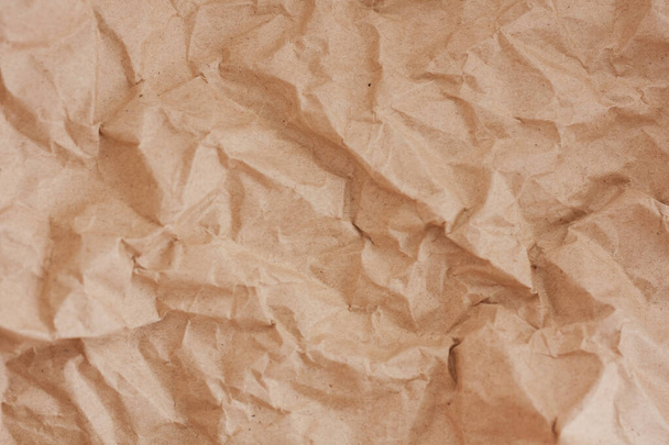 brown recycled crumpled paper background: crush  fold texture backgrounds for design, decorative. paper texture concept - Fotó, kép