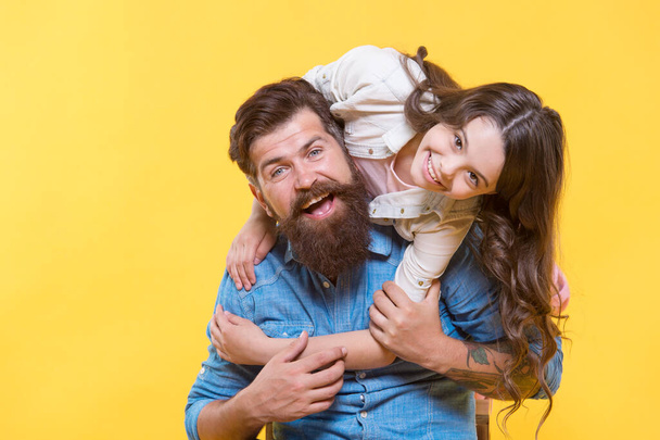 Father and happy little daughter having fun, lovely hug concept - Photo, Image