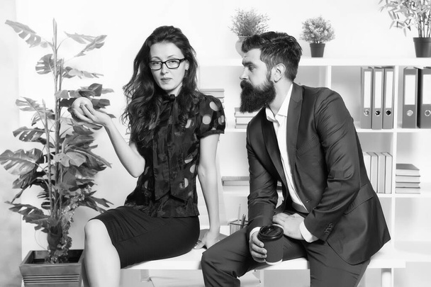 Meal break. Business couple enjoy office snack. Sensual girl and bearded man during work break. Snack break at workplace. Coffee break. Healthy eating. Vitamin nutrition. Office life. Working day - Фото, изображение