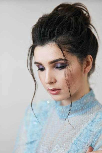 modest attractive brunette with beautiful makeup - Fotografie, Obrázek