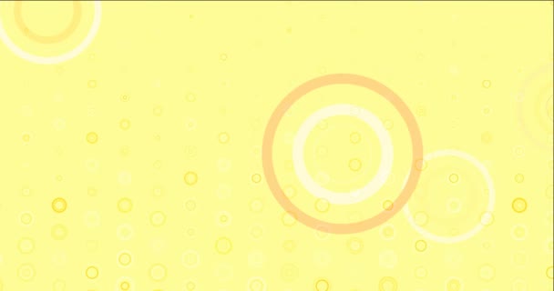 4K smyčka světle žluté video záběry s kruhy. - Záběry, video
