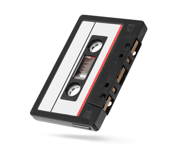 Old autio tape compact cassette with blank tag isolated on white background. Clipping path - Φωτογραφία, εικόνα