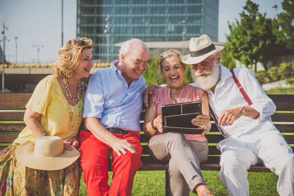 Group of seniors  having fun in the city - Фото, изображение