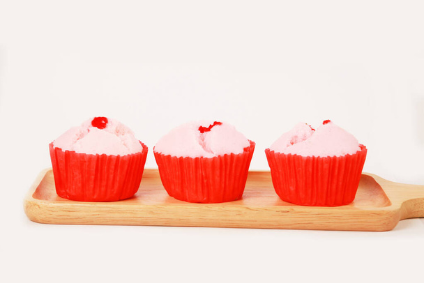 close up of fresh tasty cupcakes on white background  - Foto, Imagem