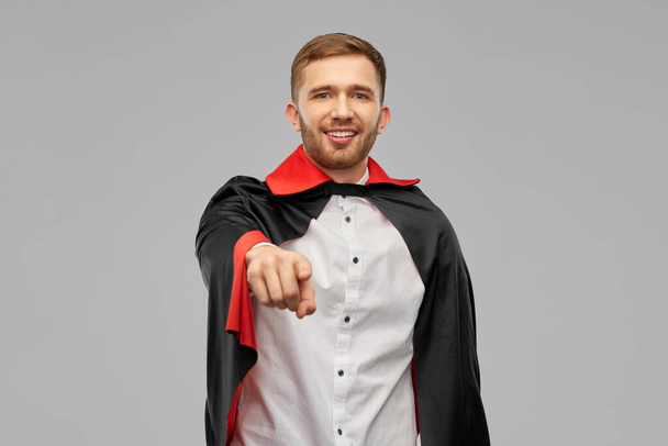 man in vampire cape pointing finger to camera - Фото, зображення