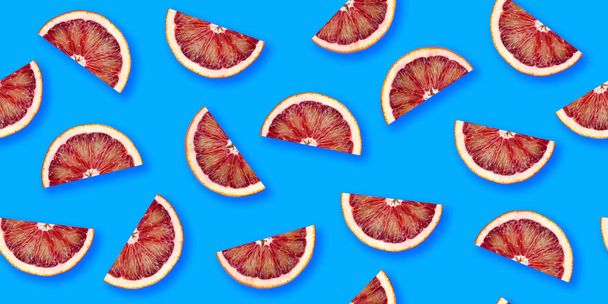Orange citrus slices seamless backdrop texture. Flat lay backdrop - Photo, Image