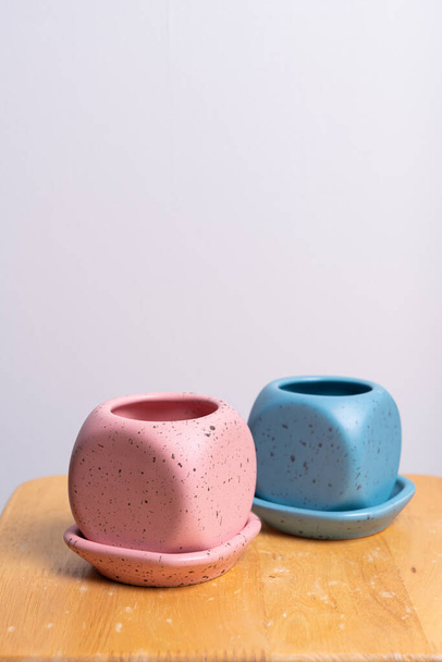 empty and beautiful clay flower pot on wood table - Фото, зображення