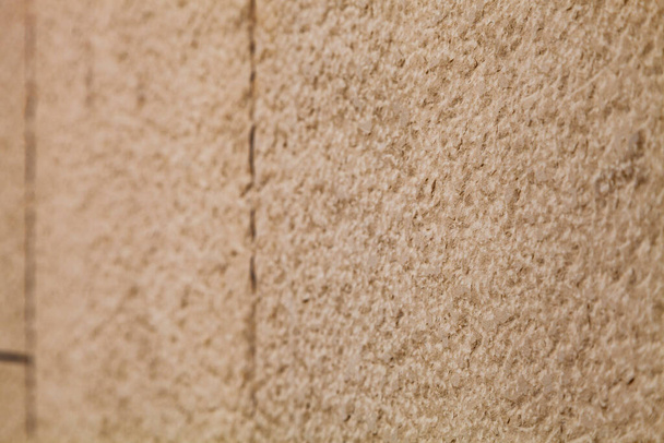 Brown stone wall, close-up background. Place for your text. - Foto, afbeelding