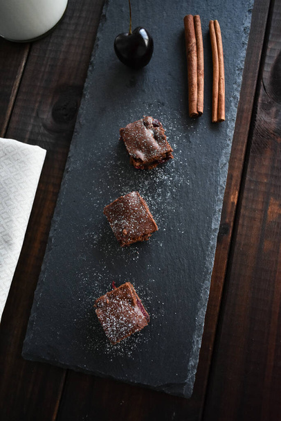 Brownie with chocolate and cherry - Foto, Bild