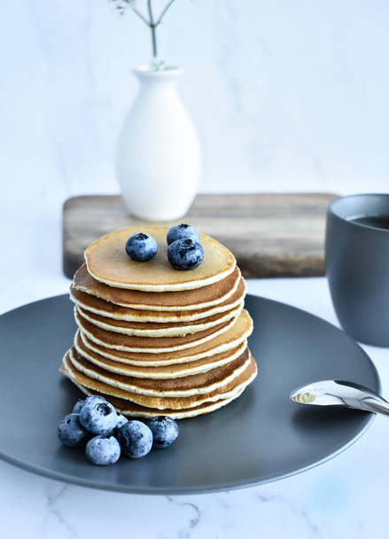 Morning pancakes with blueberries - Фото, изображение