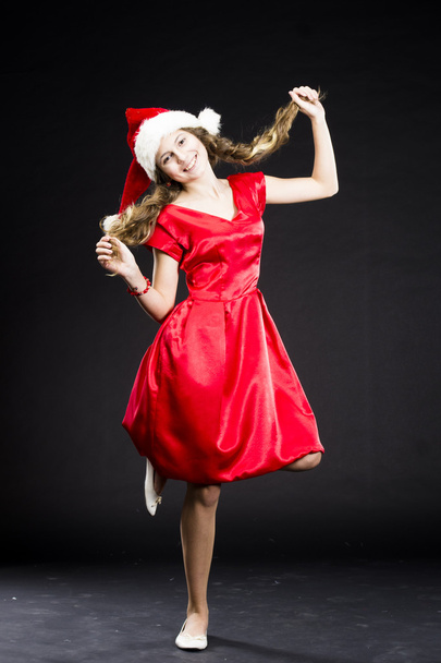 cute teen girl in santa claus costume - Foto, Imagem