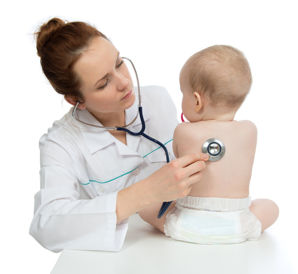 nurse auscultating child baby patient spine with stethoscope - Фото, изображение