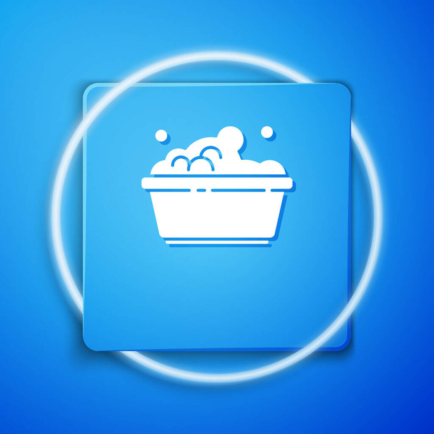 White Plastic basin with soap suds icon isolated on blue background. Bowl with water. Washing clothes, cleaning equipment. Blue square button. Vector Illustration. - Vector, Image