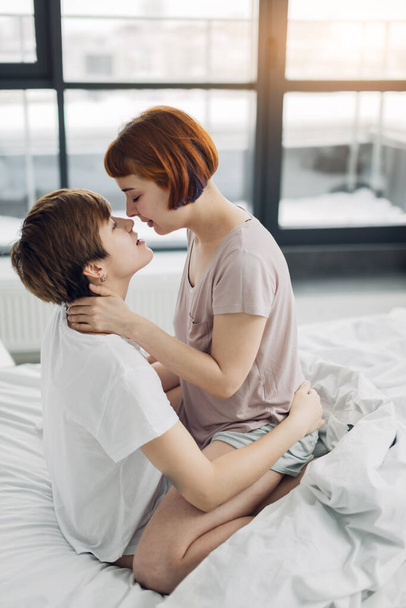warm, tender kiss. sexual contact between women - Photo, Image