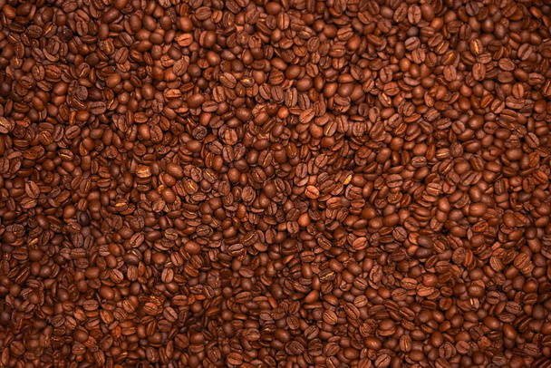 Предыстория жареного кофе. Текстура коричневого кофе. - Фото, изображение
