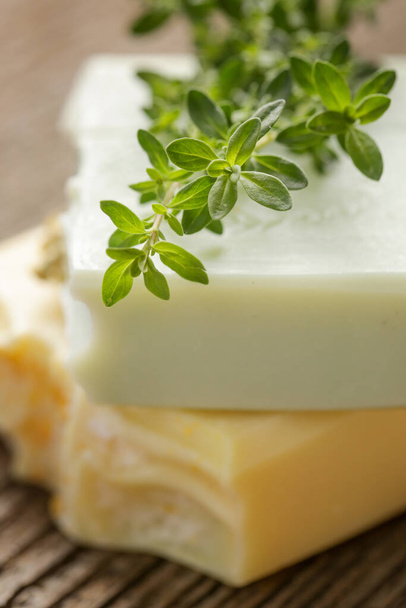 Oregano lemon scented handmade soap bars, close up. Homemade toxic-free natural organic cosmetic  - Photo, Image