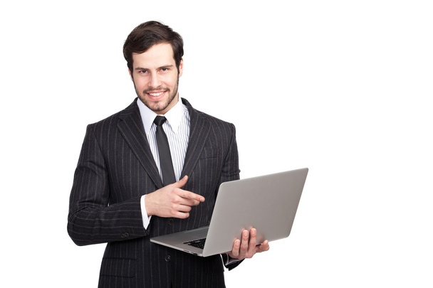 confident businessman with a laptop - Foto, afbeelding