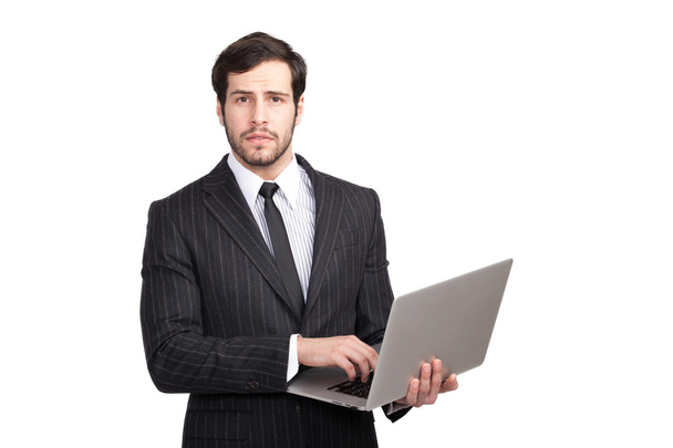 handsome businessman with a laptop - Фото, изображение