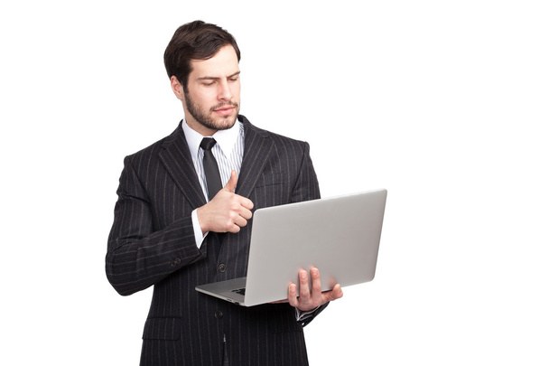 businessman showing ok with a laptop - 写真・画像