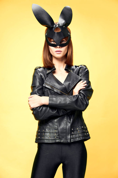 Sexy woman in rabbit mask and black suit, temptation - Foto, immagini
