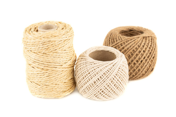 Linen, hemp and cotton rope reels isolated on white background. - Photo, Image