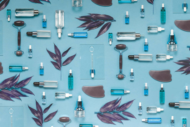 Natural Serums and face oils. Cosmetic hydrating serum in a glass bottle with pipette close up. Hyaluronic acid on abstract background top horizontal copyspace. - Photo, Image