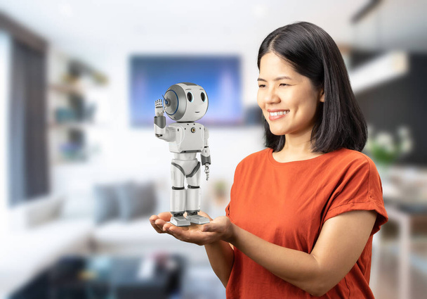 Robot assistant concept avec asiatique femme tenir 3d rendu robot - Photo, image