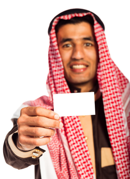 Young smiling arab showing business card in hand isolated on whi - Foto, Imagen