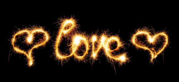 Valentines Day - Love made a sparkler on black - Photo, image