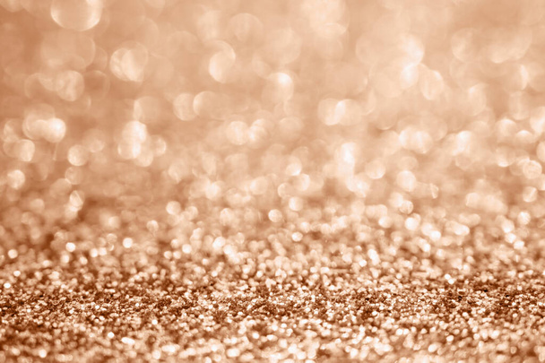 Absztrakt elmosódott rózsa arany csillogás csillogás disszidált bokeh fény háttér - Fotó, kép