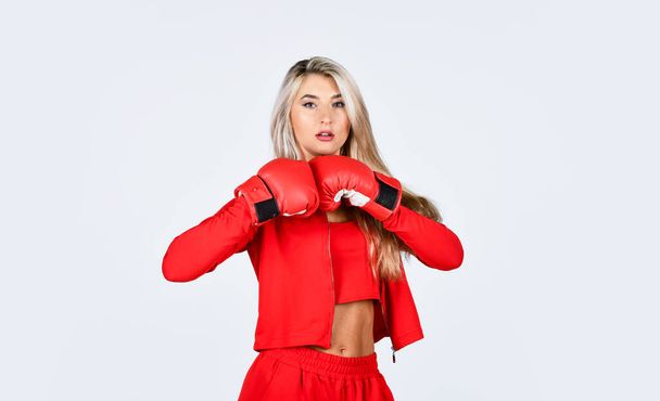 Sport. do exercise in boxing gloves. Sports training. best motivation for her. active lifestyle concept. girl doing boxing workout in gym. wear gloves to hitting. woman actively train in gym - Zdjęcie, obraz