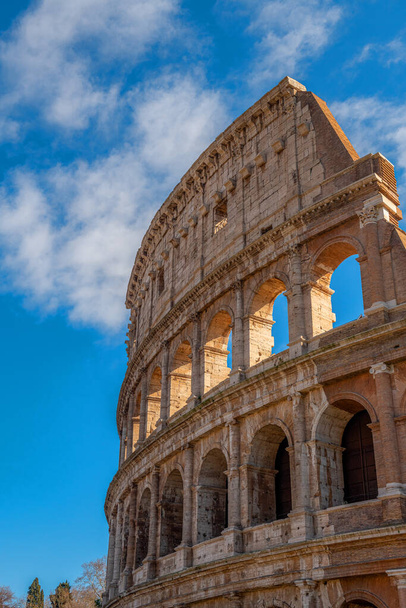 The historic Coloseum against the blue sky - Photo, image