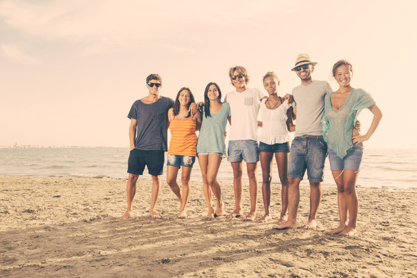 Multiethnic Group of Friends at Beach - Foto, afbeelding