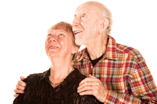 Happy seniuor couple looking up - Foto, imagen