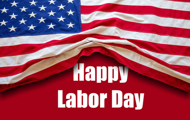 Happy Labor Day greeting, invitation card. National american holiday, text and USA flag on red color background. Festive poster, banner - Photo, Image