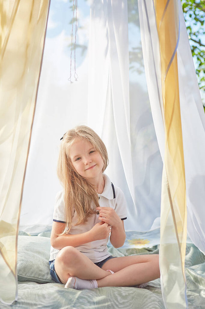 Little girl in  white chiffon tent. Childhood, tenderness, beauty - Zdjęcie, obraz