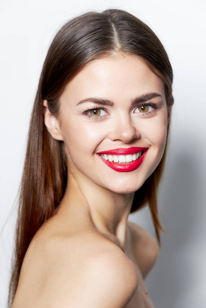 Brunette bright makeup A broad smile enchants the joy of spa treatment - Photo, Image