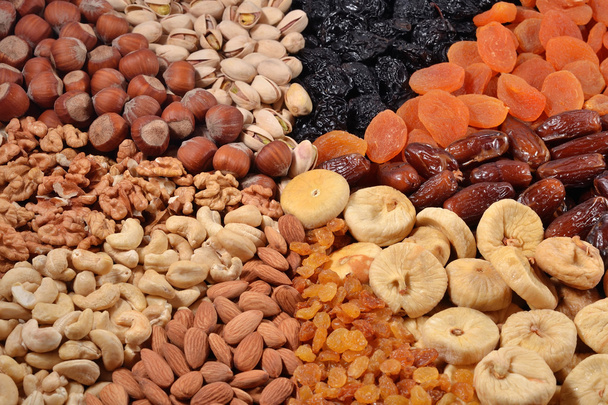 Assorted nuts and dried fruits - Фото, зображення