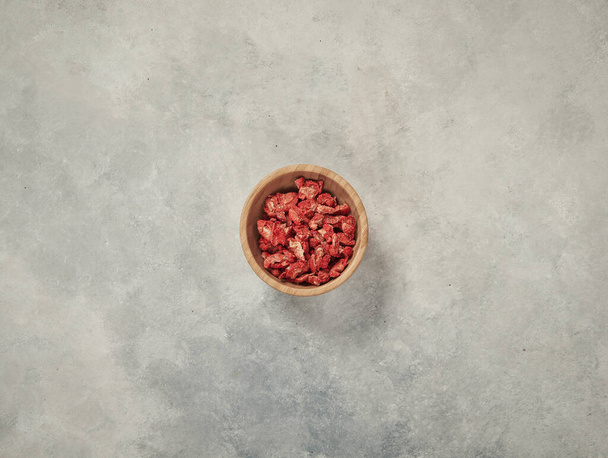 nuts in the plate and up concept, marble grey background. - Foto, afbeelding